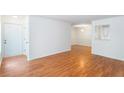 Inviting living space with hardwood floors and lots of natural light at 307 Berkeley Woods Dr, Duluth, GA 30096