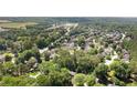 Aerial view of a lush residential neighborhood with mature trees and well-maintained homes at 1489 Kolb Ridge Sw Dr, Marietta, GA 30008