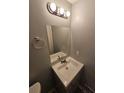 Clean bathroom featuring a mirror, vanity, and good lighting at 2860 Cocklebur Cove Ct, Decatur, GA 30034