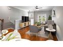Cozy living area with hardwood floors, a flat-screen TV, and comfortable seating at 2015 Liberty Nw Ct, Atlanta, GA 30318