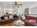 Spacious living room showcasing hardwood floors, a ceiling fan and lots of natural light at 4361 Kimball Rd, Atlanta, GA 30331