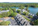 Lakeside condo community showing surrounding trees, lake and boat storage at 2300 Harbersham Marina Rd # 102, Cumming, GA 30041