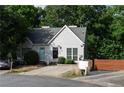 Inviting single-Gathering house featuring a well-kept lawn and a peaceful neighborhood setting at 5029 David Pl, Smyrna, GA 30082