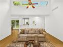 Open living room featuring natural light, hardwood floors, and high ceilings at 1997 N Landing Way, Marietta, GA 30066
