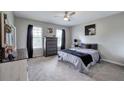 Comfortable bedroom with neutral walls, soft carpet, and stylish decor at 527 Cass White Nw Rd, Cartersville, GA 30121