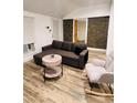 Cozy living area featuring comfortable seating and stylish decor, illuminated by natural light at 2021 Moody Drive Southwest, Atlanta, GA 30315