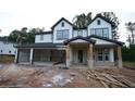 New two-story construction with white siding and dark trim details and a spacious three-car garage at 4835 Beechnut Circle, Cumming, GA 30028