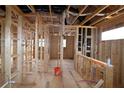 Interior view of the framing stage shows the layout and potential of this home at 4835 Beechnut Circle, Cumming, GA 30028