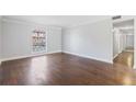 Bright living room showcasing hardwood floors and a large window at 3187 Abbeywood Dr, Decatur, GA 30034
