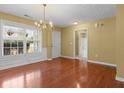 Dining room with chandelier and lots of natural light at 2457 Swan Lake Dr, Grayson, GA 30017