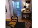 Hallway featuring hardwood floors, natural light, and stylish design details at 3655 Peachtree Rd # 203, Atlanta, GA 30319