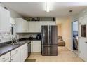 Well-lit kitchen with stainless steel appliances and plenty of cabinet space at 4150 Soaring Dr, Douglasville, GA 30135