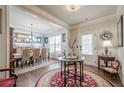 Elegant dining room featuring hardwood floors, wainscoting, and stylish decor at 285 Turtle Rock Pl, Acworth, GA 30101
