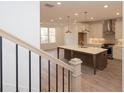 Bright, eat-in kitchen with large central island and stainless appliances at 707 Dodd N Ln # 164, Buford, GA 30518