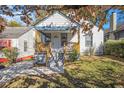 Charming bungalow with a welcoming front porch, painted in neutral colors, and set in a neighborhood setting at 763 Jones Nw Ave, Atlanta, GA 30314