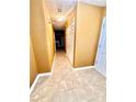 Inviting tiled hallway with closet and warm-toned walls at 3793 Mays Sw Ct, Atlanta, GA 30331