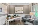 Cozy home office features a stylish desk, comfortable seating, and soothing decor at 379 Morgan Rd, Carrollton, GA 30116