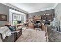 Cozy office space with a bay window, built-in shelving, and a comfortable seating area at 4045 Bridle Ridge Dr, Suwanee, GA 30024