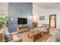 Comfortable living room with a TV and relaxed seating arrangement at 4865 Fenbrook Dr, Stone Mountain, GA 30088