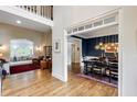 Elegant foyer with hardwood floors leading to a dining room and living room at 285 Lackland Court, Sandy Springs, GA 30350