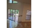 Bright living room with vaulted ceiling and sliding glass door to deck at 2565 Terrace Trl, Decatur, GA 30035