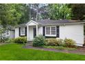 Charming exterior with black shutters and lush landscaping at 1091 Napier Se St, Atlanta, GA 30316
