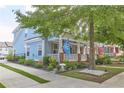 Charming house with well-manicured lawn, lush landscaping, and inviting front porch at 230 Ryan Ln, Covington, GA 30014