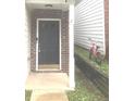 Close-up of the front entrance featuring a gray door and house number at 2849 Windsor Forrest Ct, Atlanta, GA 30349