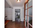 Welcoming entryway with dark wood floors and an open view into the living spaces at 4619 Sweetwater Ave, Powder Springs, GA 30127