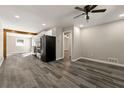 Open concept living room featuring gray flooring, recessed lighting, and a ceiling fan at 2968 Cleburne Pkwy, Powder Springs, GA 30127