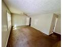 Spacious living room with a ceiling fan and a gray painted walls at 1292 Lorenzo Sw Dr, Atlanta, GA 30310