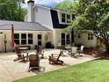 Spacious backyard patio is furnished with seating, perfect for entertaining at 2917 Townley Cir, Atlanta, GA 30340