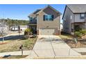 Charming two-story home with an inviting front yard and a two-car garage, perfect for Gathering living at 2528 Shropshire Pl, Mcdonough, GA 30253