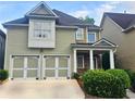 Charming two-story home featuring a two-car garage, stone accents, and well-maintained landscaping at 4230 Glen Vista Ct, Duluth, GA 30097