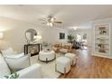 Bright living room with neutral decor, hardwood floors, and stylish furnishings at 1092 Old Roswell Rd, Roswell, GA 30076