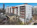 Modern apartment building exterior with balconies and large windows, showcasing urban living at its finest at 525 Parkway Dr Ne # 305, Atlanta, GA 30308
