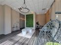Stylish lobby area with modern chandelier, unique seating, and contemporary design elements at 525 Parkway Dr Ne # 305, Atlanta, GA 30308