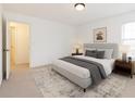 Cozy bedroom with a queen-size bed, carpet, and a tranquil atmosphere at 2901 Lenox Ne Way # 902, Atlanta, GA 30324