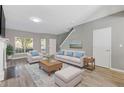 Bright living room with a fireplace, plush seating, and contemporary decor at 2566 Walden Lake Dr, Decatur, GA 30035