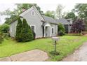 Landscaped lawn, trees, and charming mailbox enhance the curb appeal of this lovely home at 1096 Tilden Nw St, Atlanta, GA 30318
