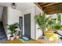 Inviting front entrance with a welcoming mat, cute decor, and a cozy, decorated outdoor space at 1990 Wellbourne Dr # 5, Atlanta, GA 30324