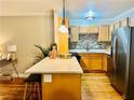 Modern kitchen with stainless steel appliances, ample counter space, and sleek finishes at 1990 Wellbourne Dr # 5, Atlanta, GA 30324