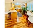 Well-lit kitchen with stainless steel appliances, a breakfast bar, and an adjacent dining area at 1990 Wellbourne Dr # 5, Atlanta, GA 30324