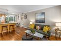Bright living room featuring hardwood floors, stylish furnishings, and natural light from window at 1990 Wellbourne Dr # 5, Atlanta, GA 30324