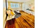 Cozy living room boasts hardwood floors, a comfortable couch, and a stylish area rug at 1990 Wellbourne Dr # 5, Atlanta, GA 30324