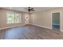 Open living room featuring sleek flooring, natural light, and a fresh, modern design at 3275 Dodson Dr, East Point, GA 30344