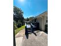Backyard view featuring a blue deck and patio, ideal for outdoor gatherings and leisure at 3593 Adkins Nw Rd, Atlanta, GA 30331