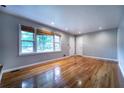 Bright living room with natural light and hardwood floors, great for entertaining at 218 Woodview Se Ln, Smyrna, GA 30082