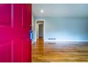 View of the living room featuring hardwood floors and neutral paint at 218 Woodview Se Ln, Smyrna, GA 30082