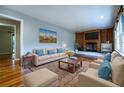 Inviting living room features hardwood floors, a fireplace, and comfortable seating at 218 Woodview Se Ln, Smyrna, GA 30082